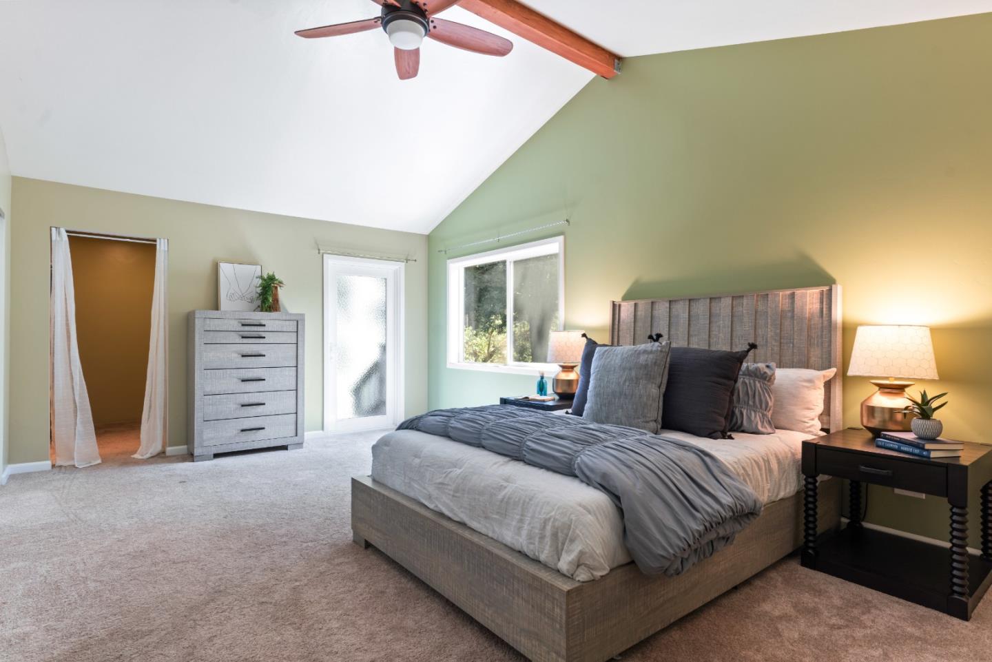 1850 Pine Flat Road Santa Cruz, CA 95060 - Photo 20 of 62 a spacious bedroom with a bed and furniture