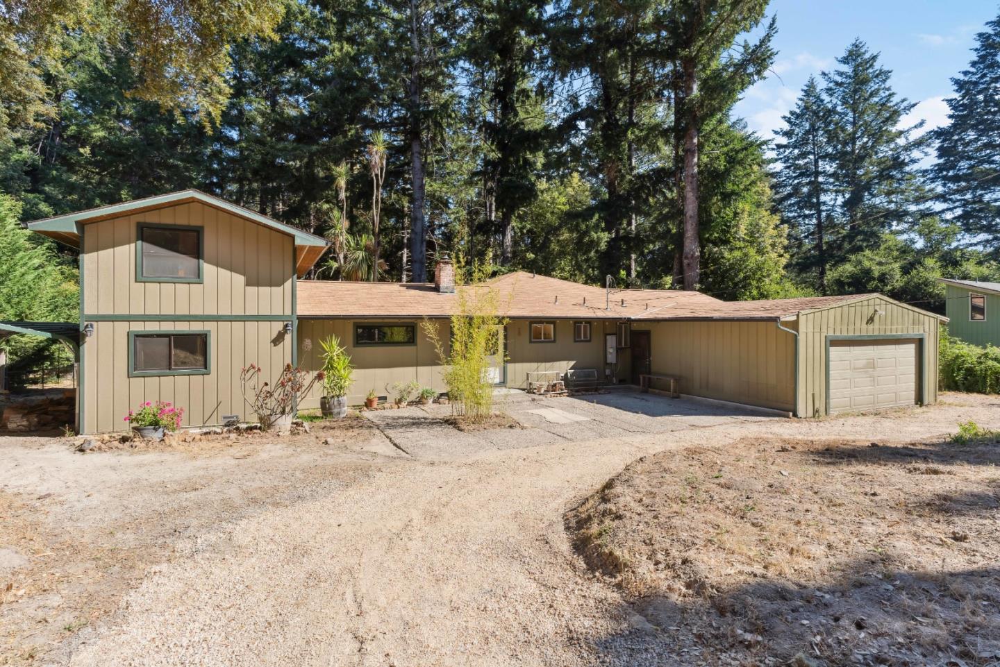 1850 Pine Flat Road Santa Cruz, CA 95060 - Photo 2 of 62 a front view of a house with a yard