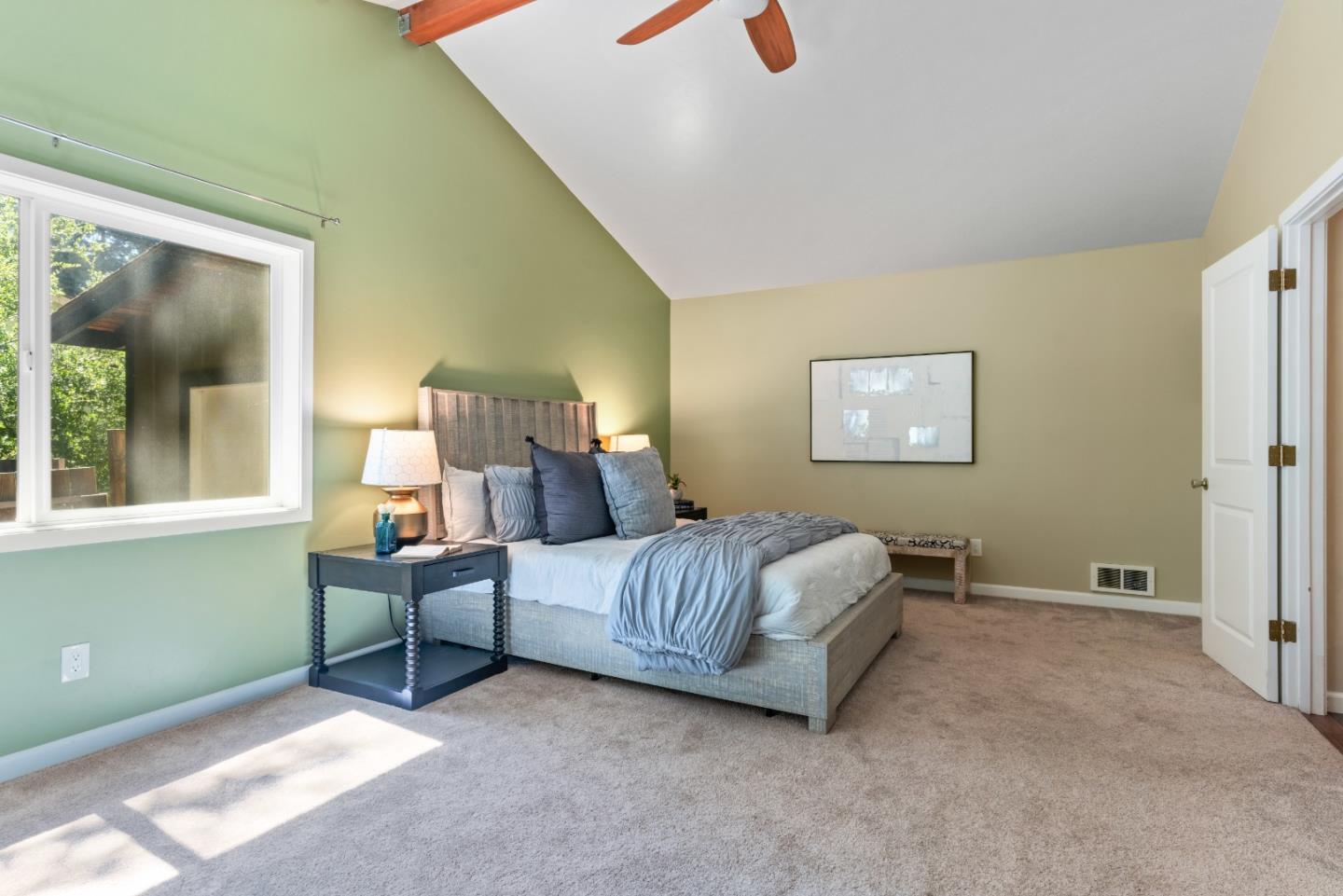 1850 Pine Flat Road Santa Cruz, CA 95060 - Photo 21 of 62 a spacious bedroom with a bed and a window