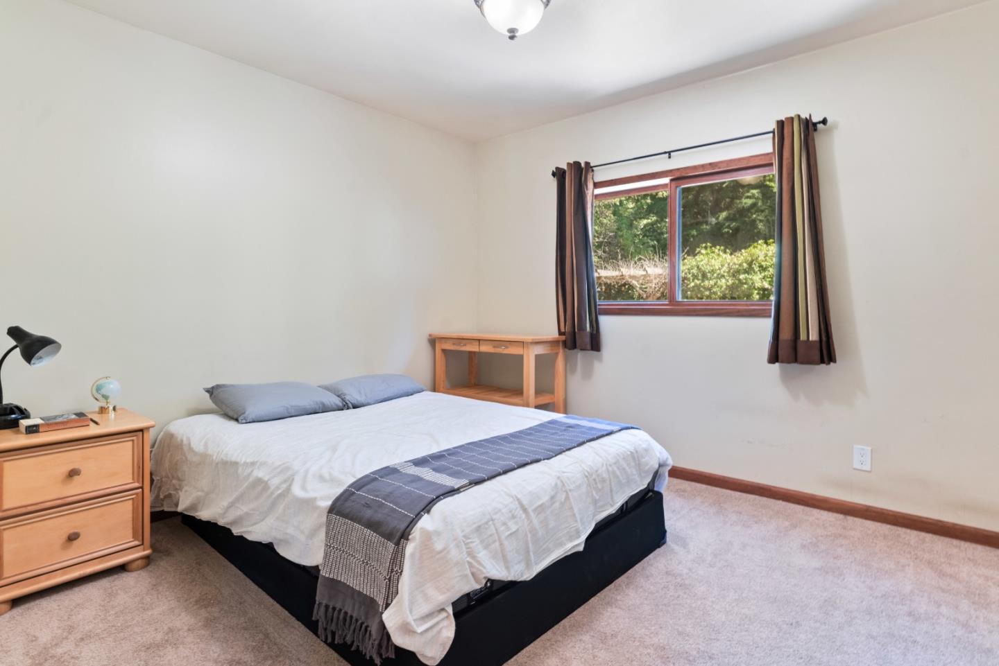 1850 Pine Flat Road Santa Cruz, CA 95060 - Photo 27 of 62 a bedroom with a bed and window