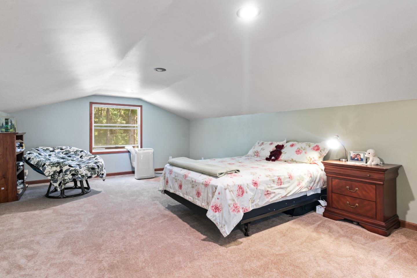 1850 Pine Flat Road Santa Cruz, CA 95060 - Photo 36 of 62 a bedroom with a bed and a couch