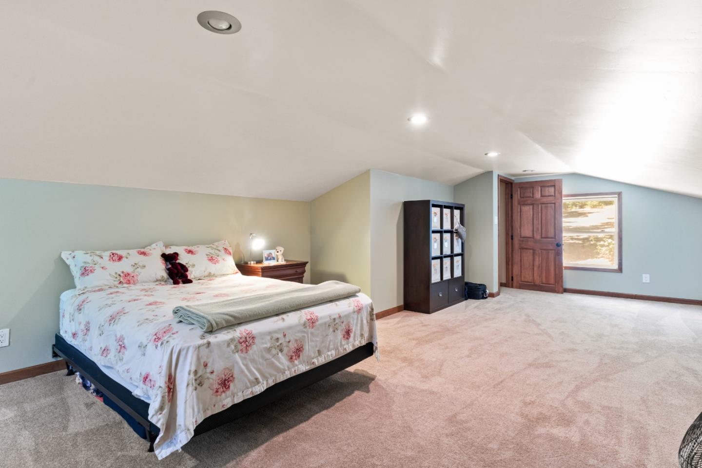 1850 Pine Flat Road Santa Cruz, CA 95060 - Photo 37 of 62 a bedroom with a large bed and a window