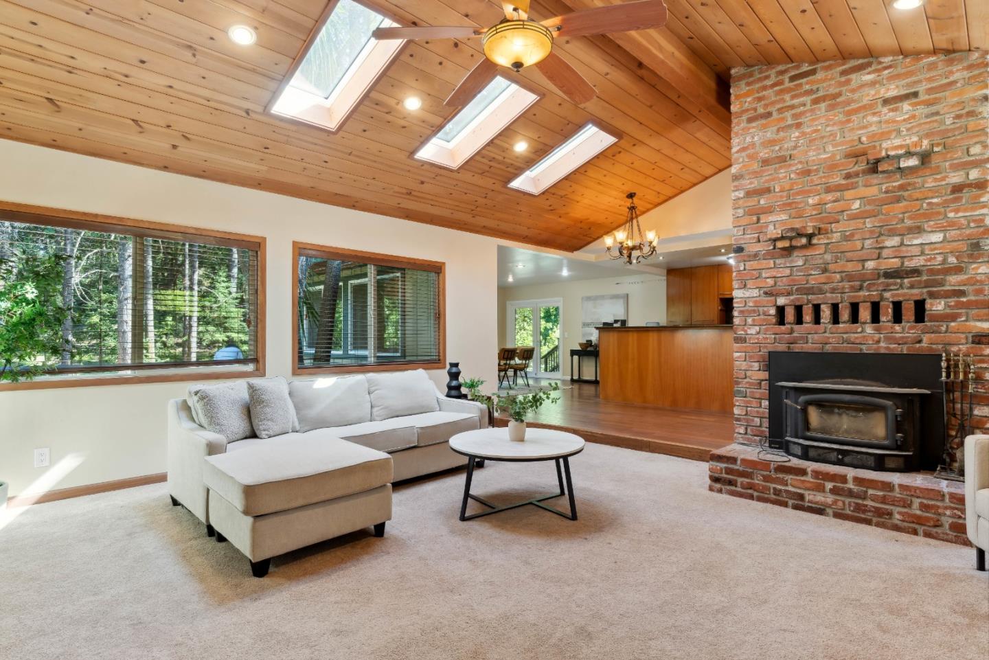1850 Pine Flat Road Santa Cruz, CA 95060 - Photo 4 of 62 a living room with furniture and a fireplace