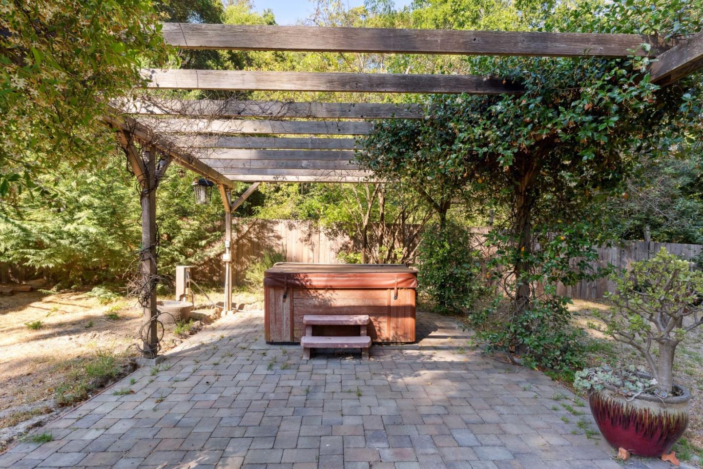1850 Pine Flat Road Santa Cruz, CA 95060 - Photo 51 of 62 a wooden bench sitting in front of a building