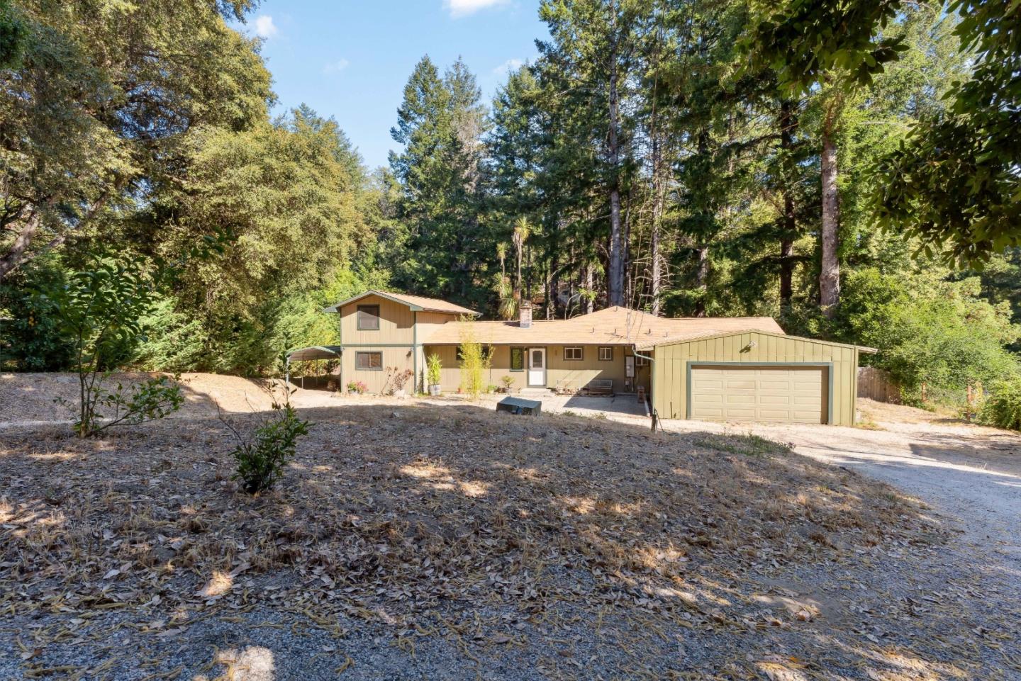 1850 Pine Flat Road Santa Cruz, CA 95060 - Photo 58 of 62 a front view of a house with a yard and large trees