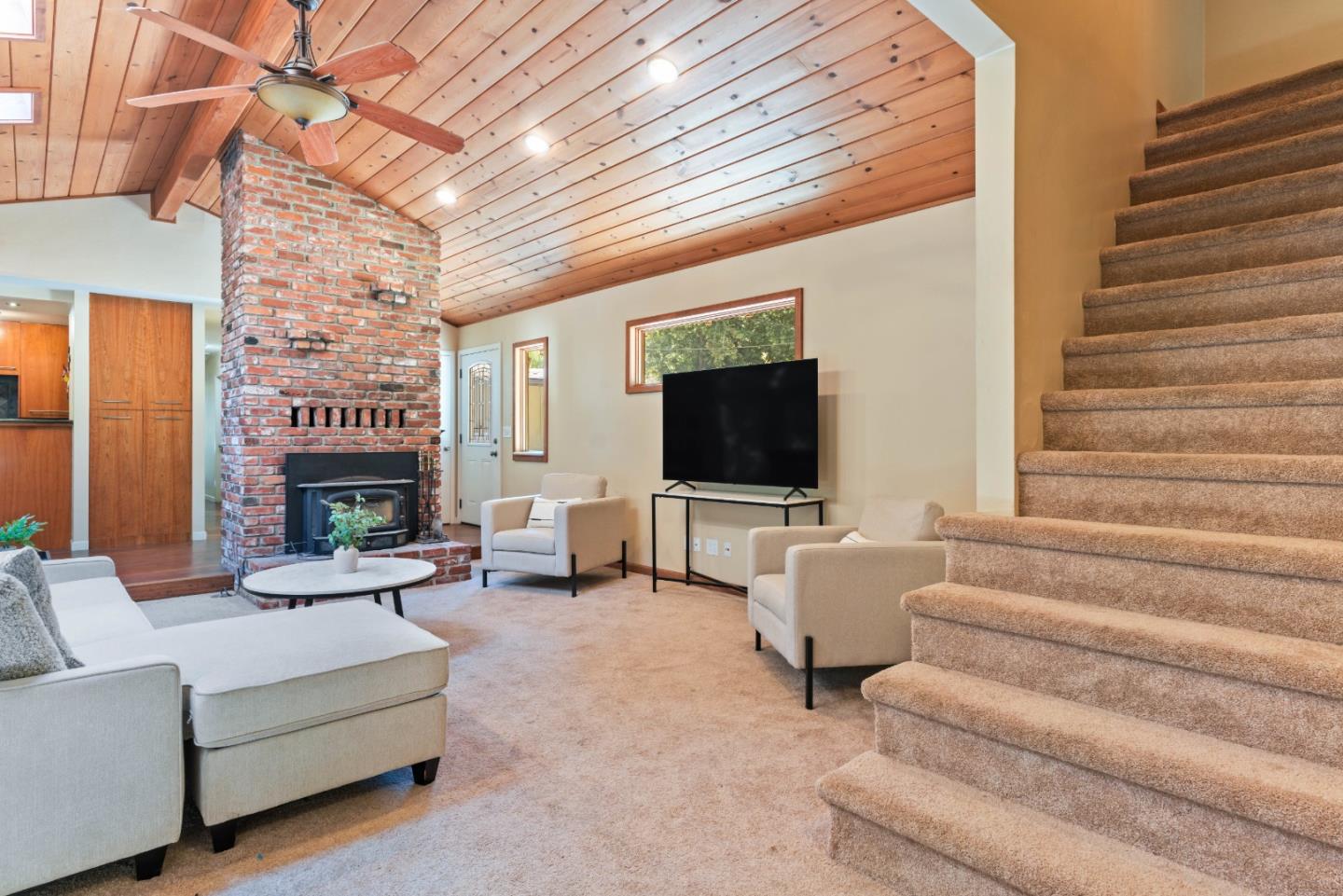 1850 Pine Flat Road Santa Cruz, CA 95060 - Photo 7 of 62 a living room with furniture and a flat screen tv