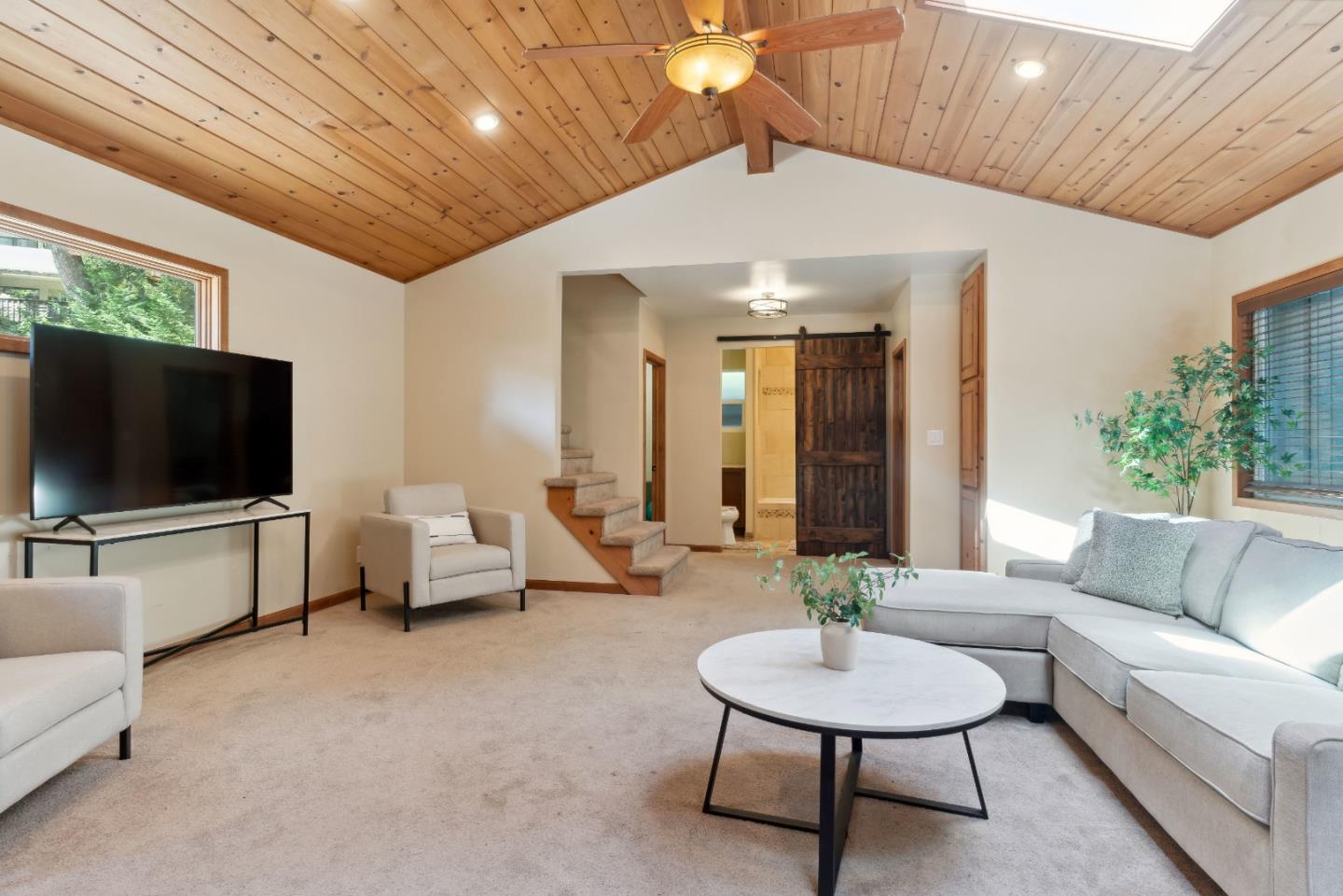 1850 Pine Flat Road Santa Cruz, CA 95060 - Photo 8 of 62 a living room with furniture and a flat screen tv