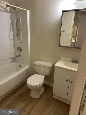 a bathroom with a toilet sink and a bathtub