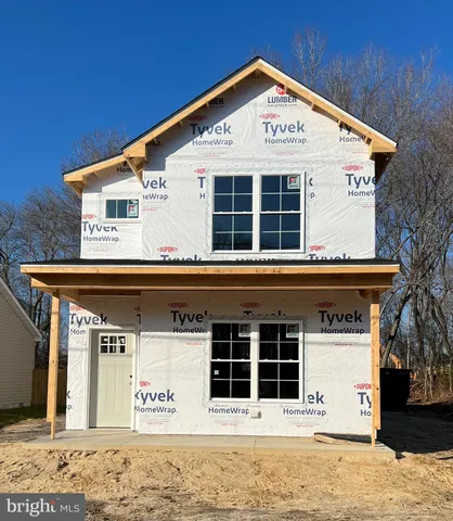 a view of a house with a large window