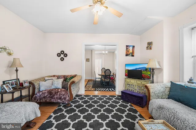 a living room with furniture and a couch