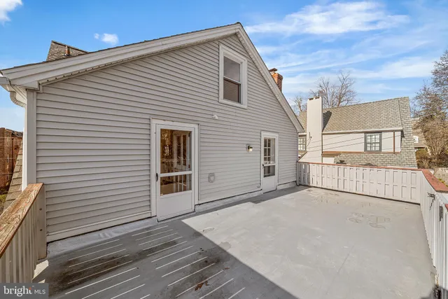 a view of a house with a roof deck