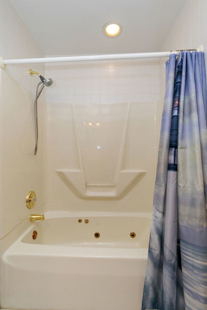 517 Sheffield Road Naperville, IL 60565 - Photo 16 of 29 a bathroom with a shower