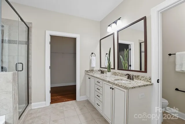a white bath tub sitting next to a window