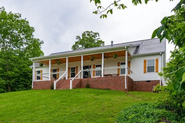front view of a house with a yard