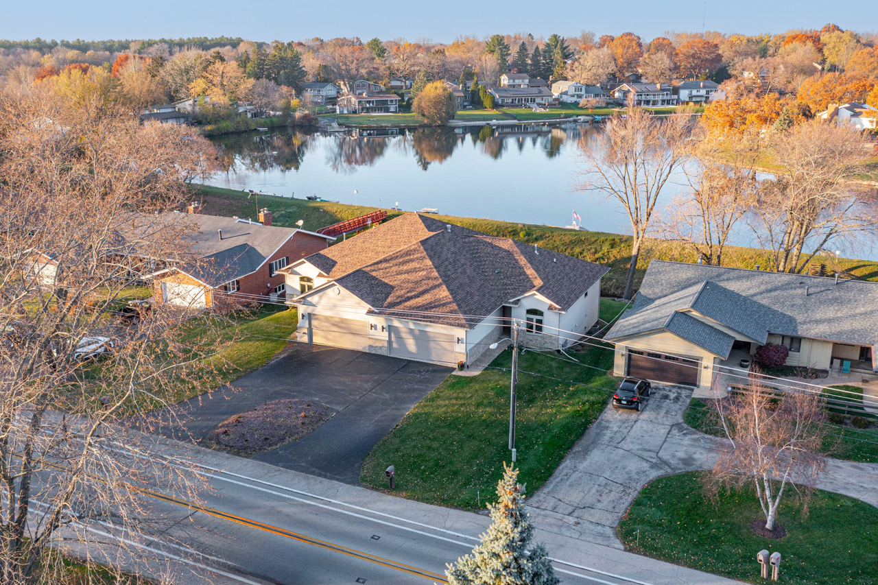 5624 Spring Brook Road, Unit 5624 Rockford, IL 61114 - Photo 1 of 34 an aerial view of house with lake view