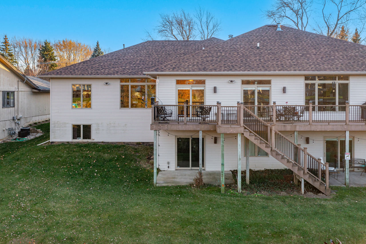 5624 Spring Brook Road, Unit 5624 Rockford, IL 61114 - Photo 29 of 34 a front view of a house with a garden