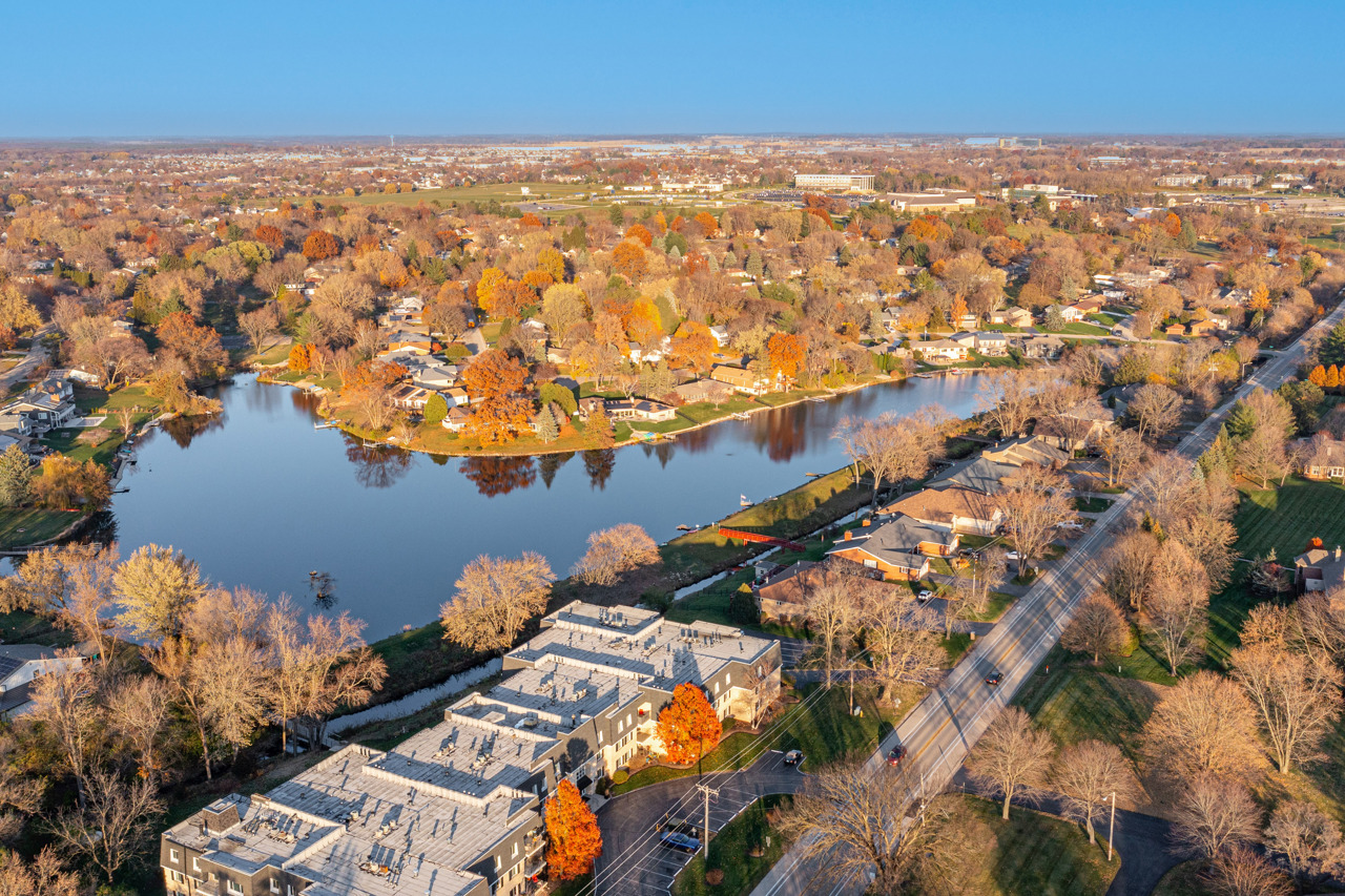 5624 Spring Brook Road, Unit 5624 Rockford, IL 61114 - Photo 3 of 34 an aerial view of multiple house