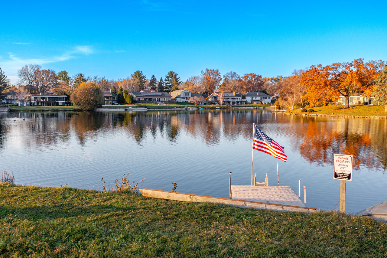 5624 Spring Brook Road, Unit 5624 Rockford, IL 61114 - Photo 32 of 34 a view of a lake with houses
