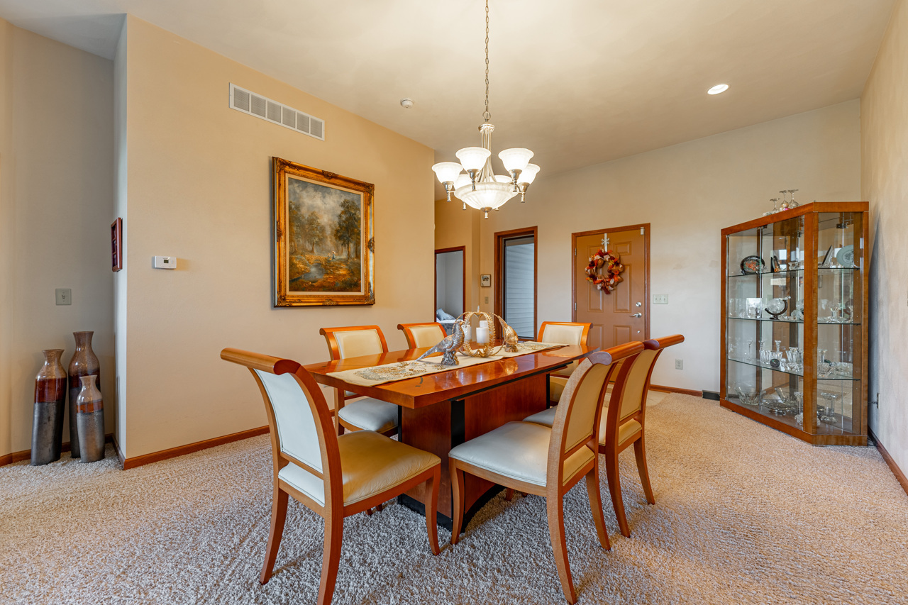 5624 Spring Brook Road, Unit 5624 Rockford, IL 61114 - Photo 7 of 34 a dining room with furniture and window