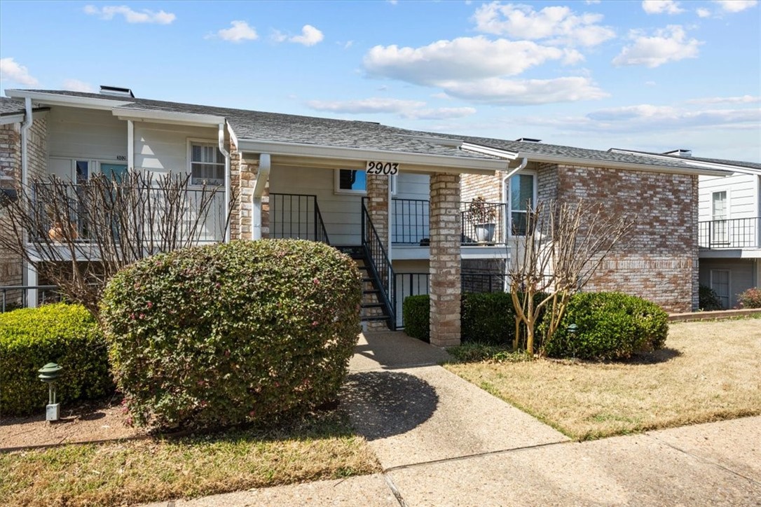 2903 Lake Shore Drive, Unit 303 Waco, TX 76708 - Photo 1 of 29 a view of a house with a porch
