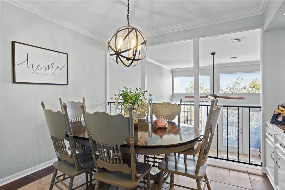 2903 Lake Shore Drive, Unit 303 Waco, TX 76708 - Photo 12 of 29 a view of a dining room with furniture window and wooden floor