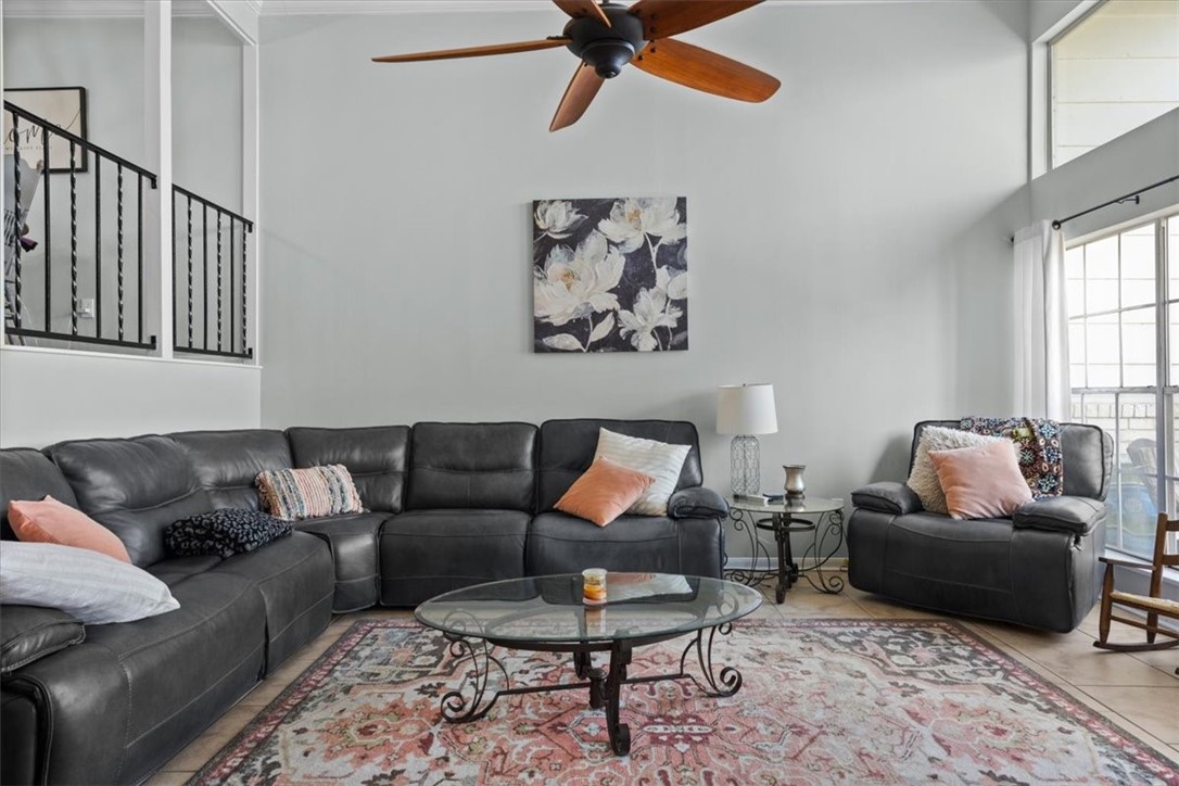 2903 Lake Shore Drive, Unit 303 Waco, TX 76708 - Photo 4 of 29 a living room with furniture and a window