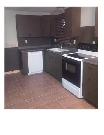 196 Bumstead Road Monson, MA 01057 - Photo 13 of 16 a kitchen with a sink and cabinets