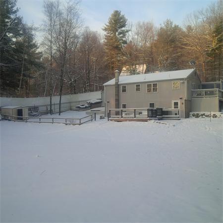 196 Bumstead Road Monson, MA 01057 - Photo 15 of 16 a view of a house with a snow on the road