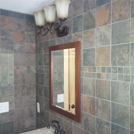 196 Bumstead Road Monson, MA 01057 - Photo 4 of 16 a bathroom with a light fixture a toilet and a shower