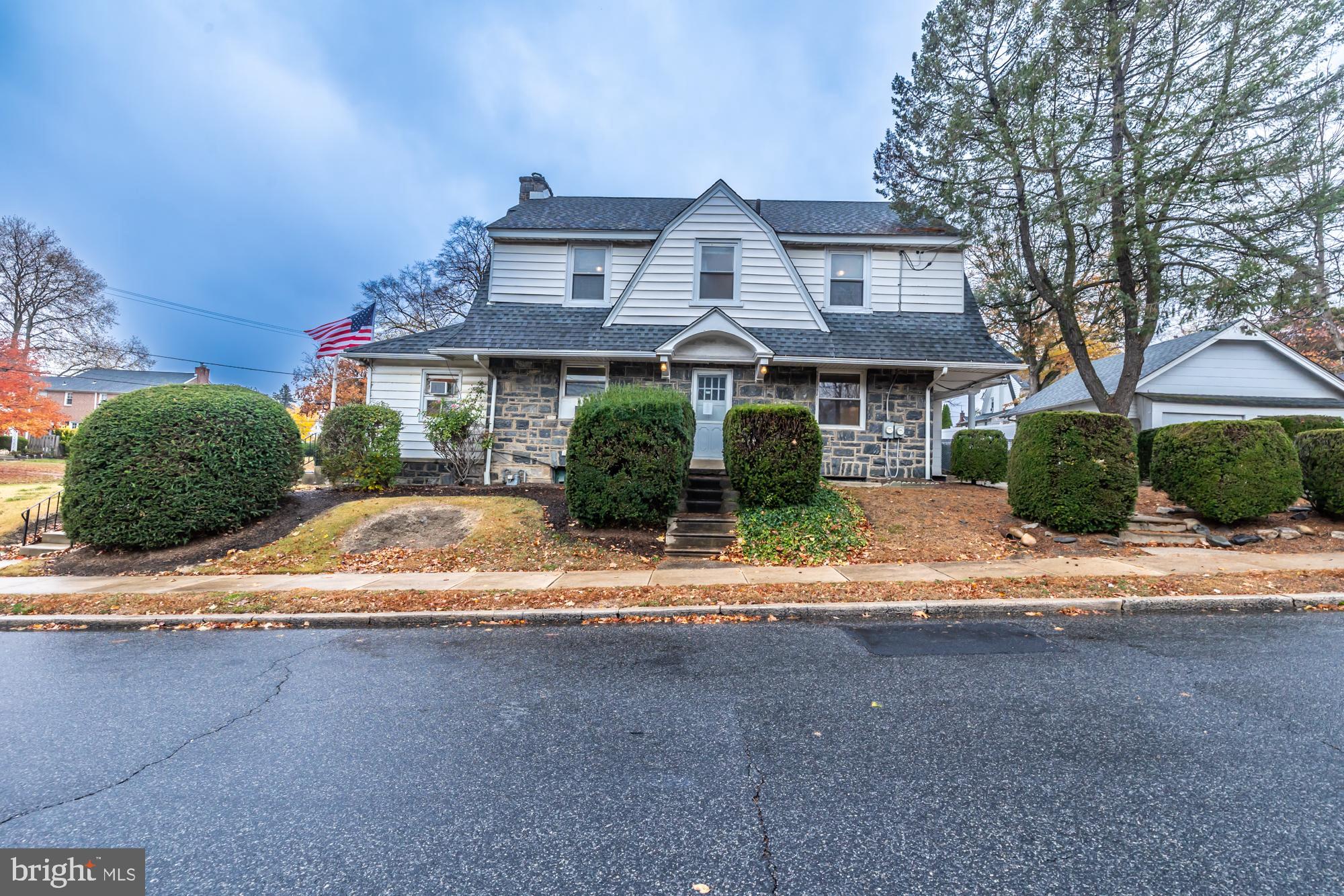 3601 State Road Drexel Hill, PA 19026 - Photo 1 of 32 a front view of a house with a yard and a garage