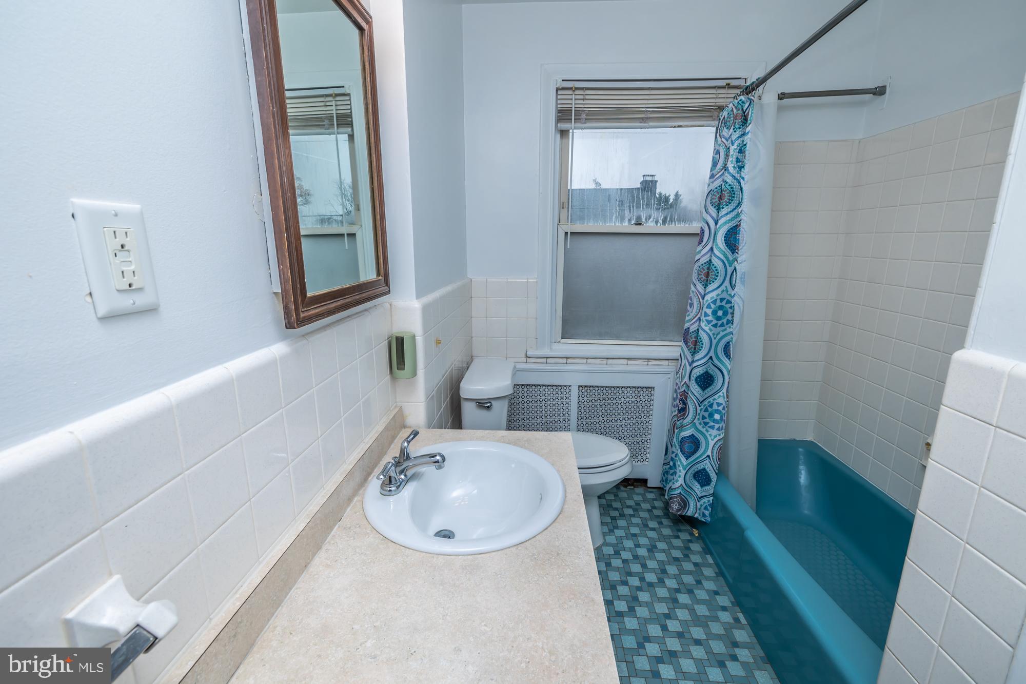 3601 State Road Drexel Hill, PA 19026 - Photo 20 of 32 a bathroom with a sink toilet and shower