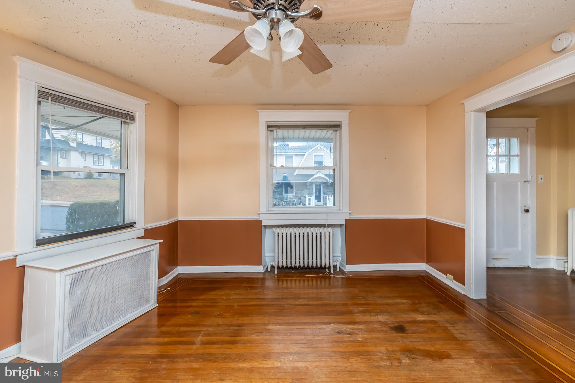 3601 State Road Drexel Hill, PA 19026 - Photo 10 of 32 a view of an empty room with window and wooden floor