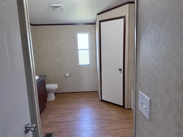 a bathroom with a toilet