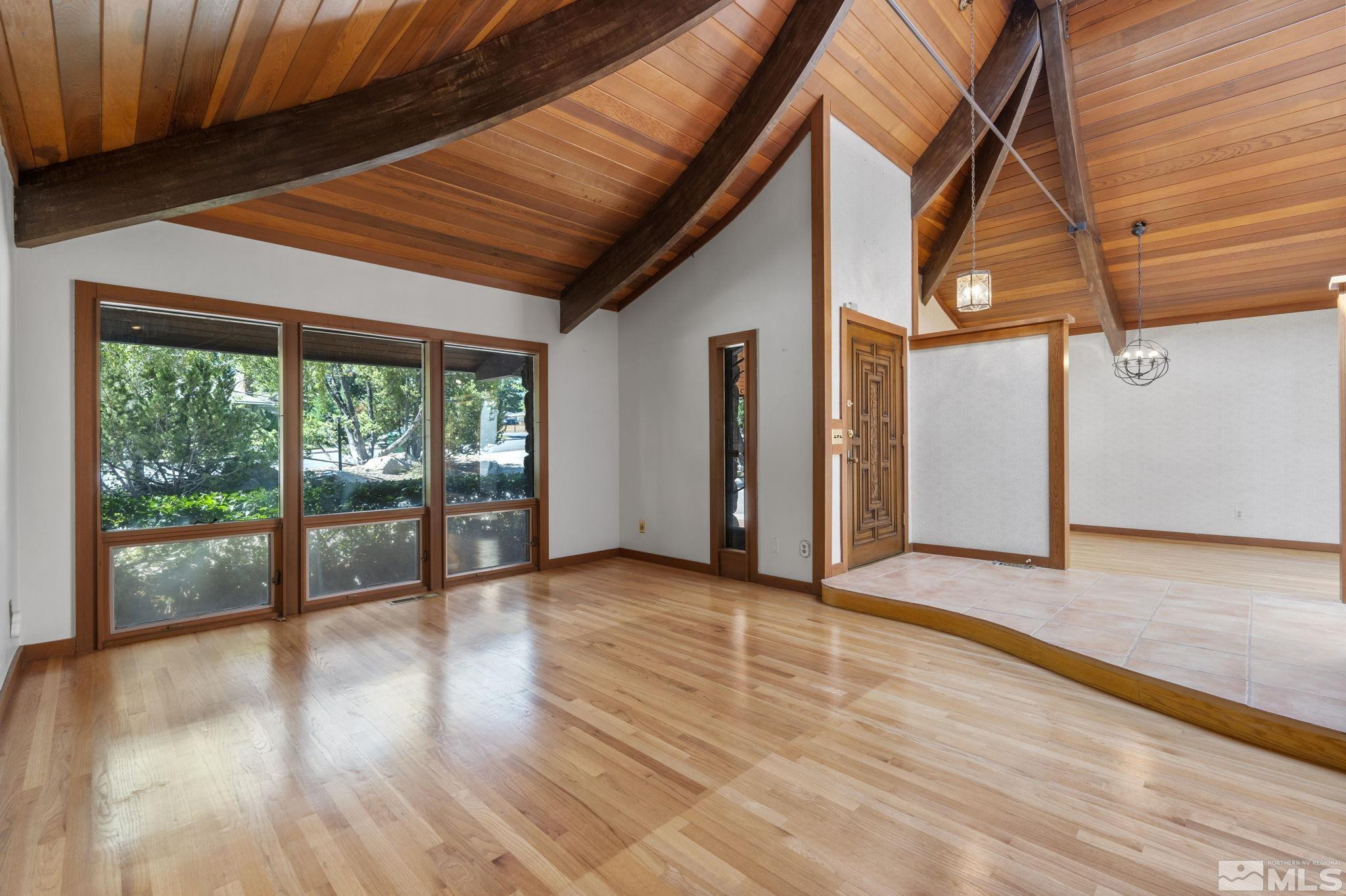 1575 Webster Way Reno, NV 89509 - Photo 11 of 40 a view of a room with wooden floor and windows