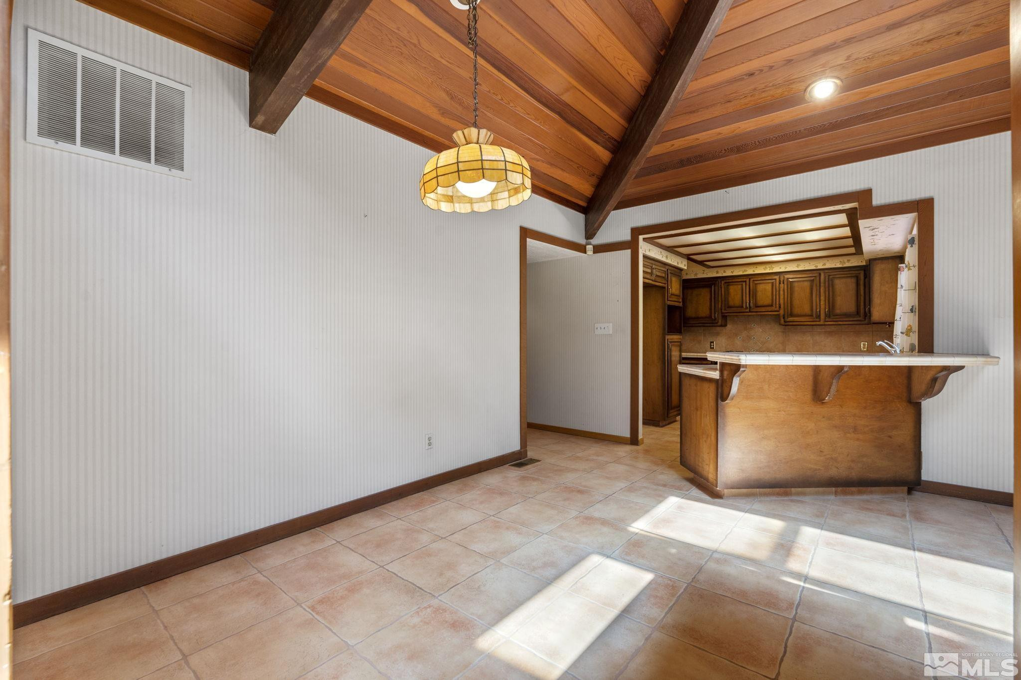 1575 Webster Way Reno, NV 89509 - Photo 17 of 40 a view of an empty room with a kitchen