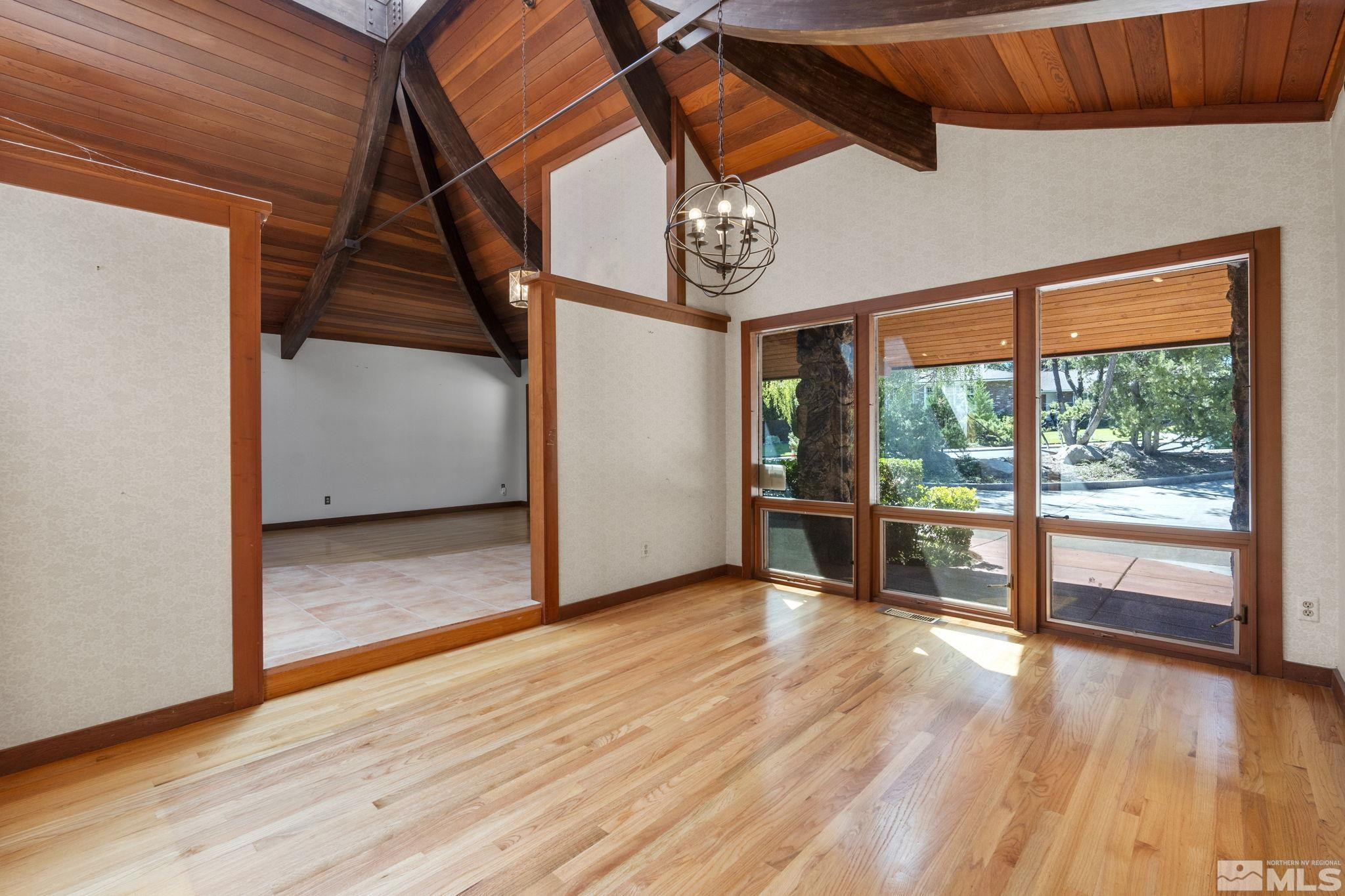 1575 Webster Way Reno, NV 89509 - Photo 20 of 40 an empty room with wooden floor and windows