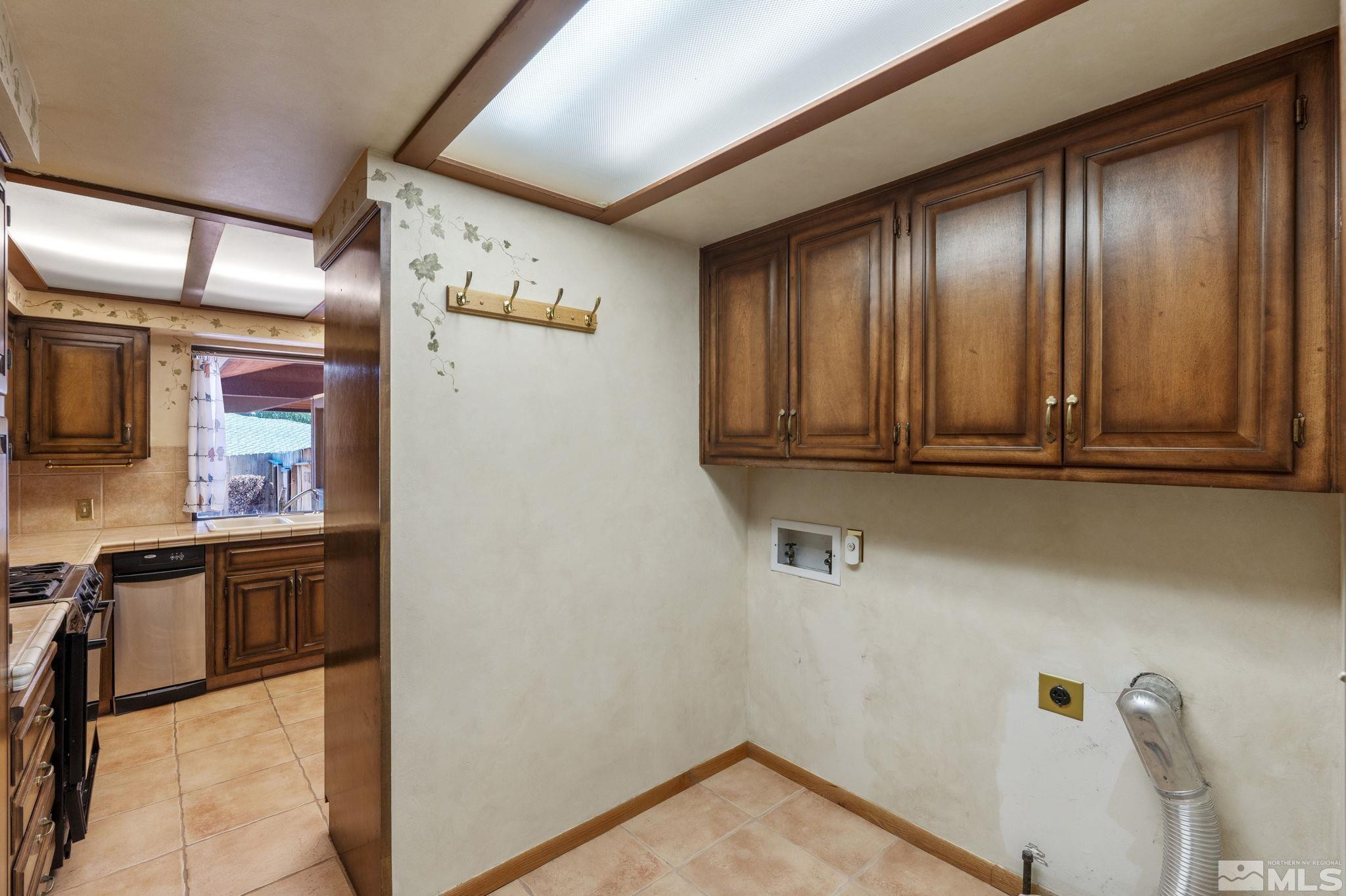 1575 Webster Way Reno, NV 89509 - Photo 31 of 40 a view of a refrigerator and window in a kitchen