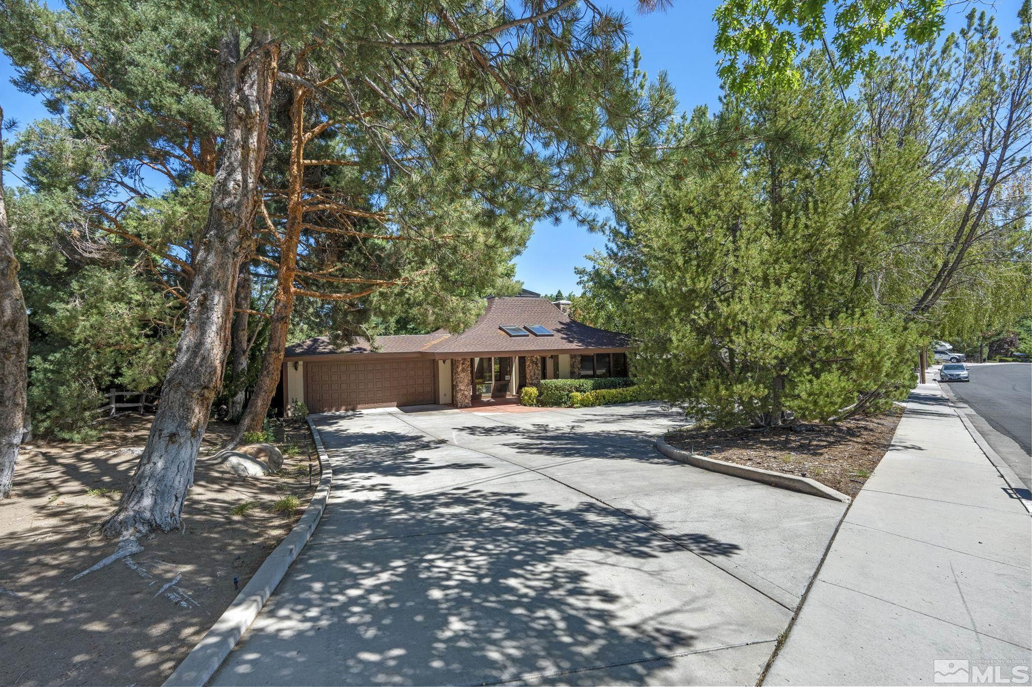 1575 Webster Way Reno, NV 89509 - Photo 6 of 40 a front view of a house with a yard
