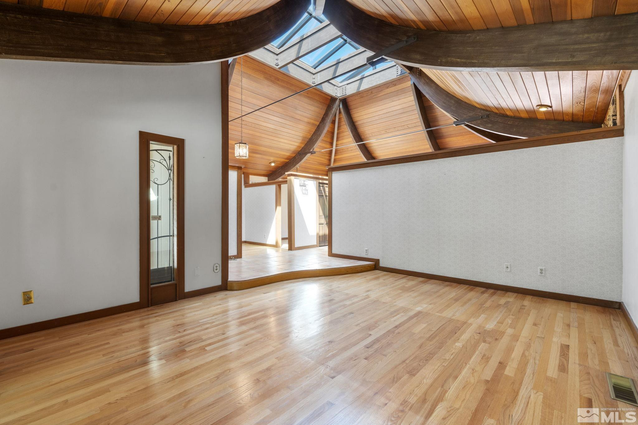 1575 Webster Way Reno, NV 89509 - Photo 10 of 40 a view of an empty room with wooden floor