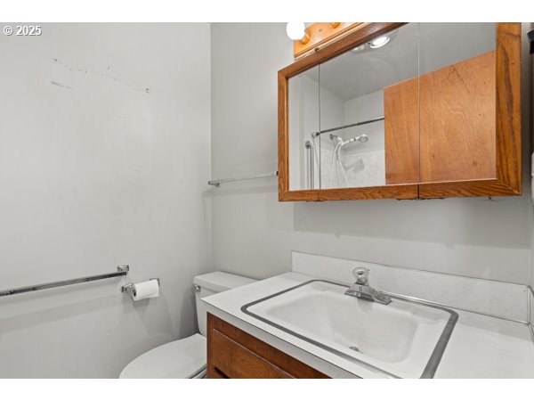 8108 Azalea-Glen Road Glendale, OR 97442 - Photo 17 of 44 a bathroom with a sink and vanity