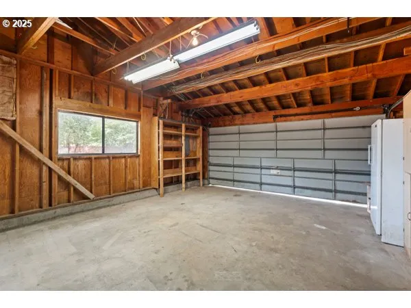a view of an empty room with a balcony