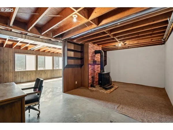 a view of an empty room with windows