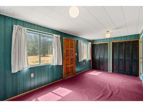 8108 Azalea-Glen Road Glendale, OR 97442 - Photo 31 of 44 a view of empty room with floor to ceiling window