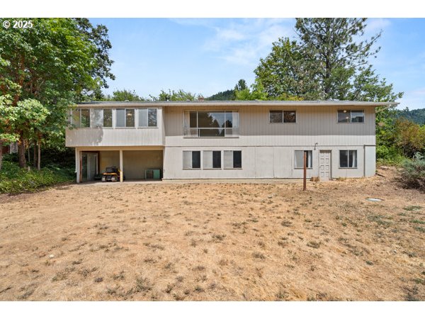 8108 Azalea-Glen Road Glendale, OR 97442 - Photo 37 of 44 a front view of a house with a yard