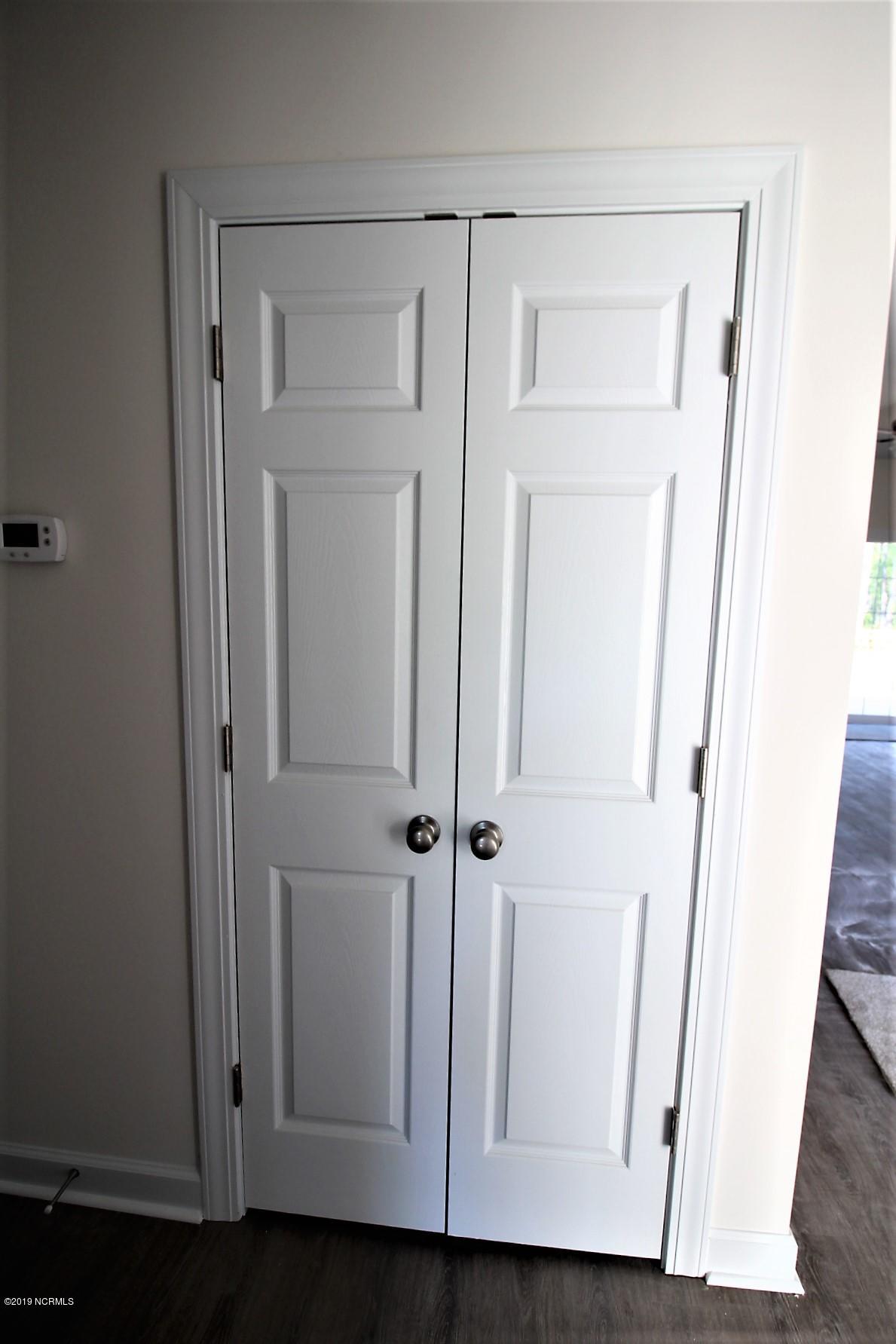 310 George Taylor Road Newport, NC 28570 - Photo 15 of 44 Front Hall Coat closet