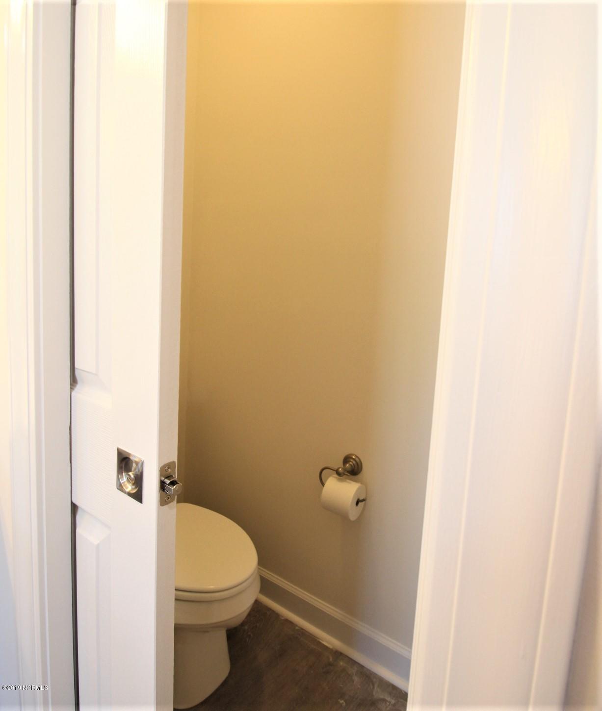 310 George Taylor Road Newport, NC 28570 - Photo 28 of 44 Pocket door into toilet closet