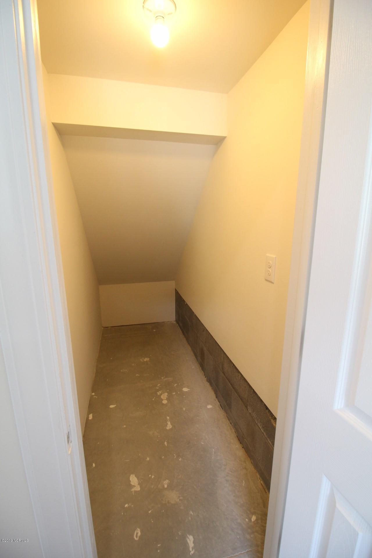 310 George Taylor Road Newport, NC 28570 - Photo 33 of 44 Storage closet in garage
