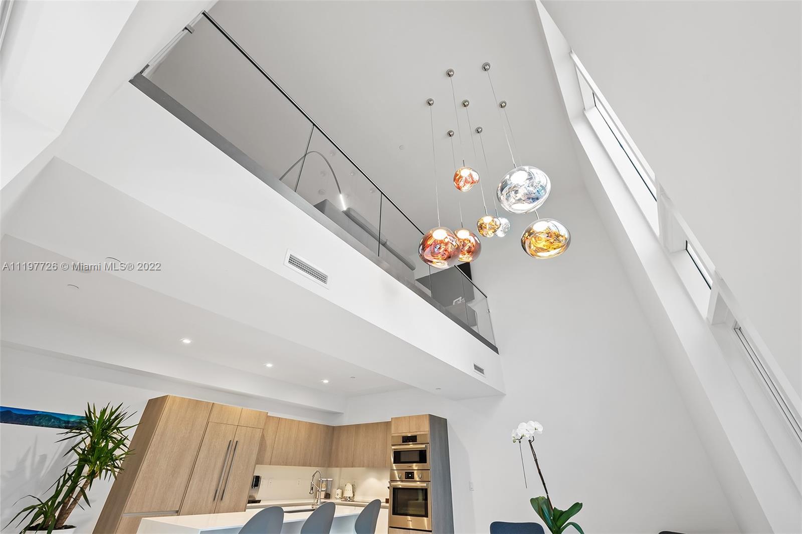 455 Northeast 39th Street, Unit 112 Miami, FL 33137 - Photo 11 of 40 a living room with a white couch