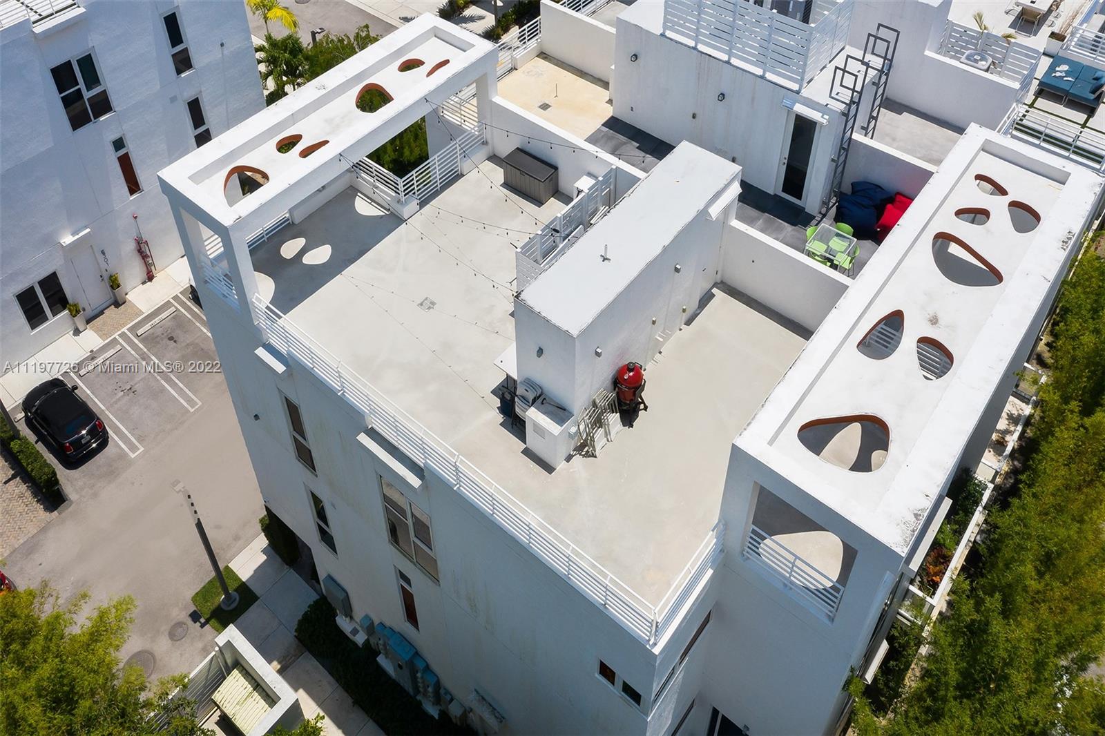 455 Northeast 39th Street, Unit 112 Miami, FL 33137 - Photo 28 of 40 an aerial view of a house with outdoor space