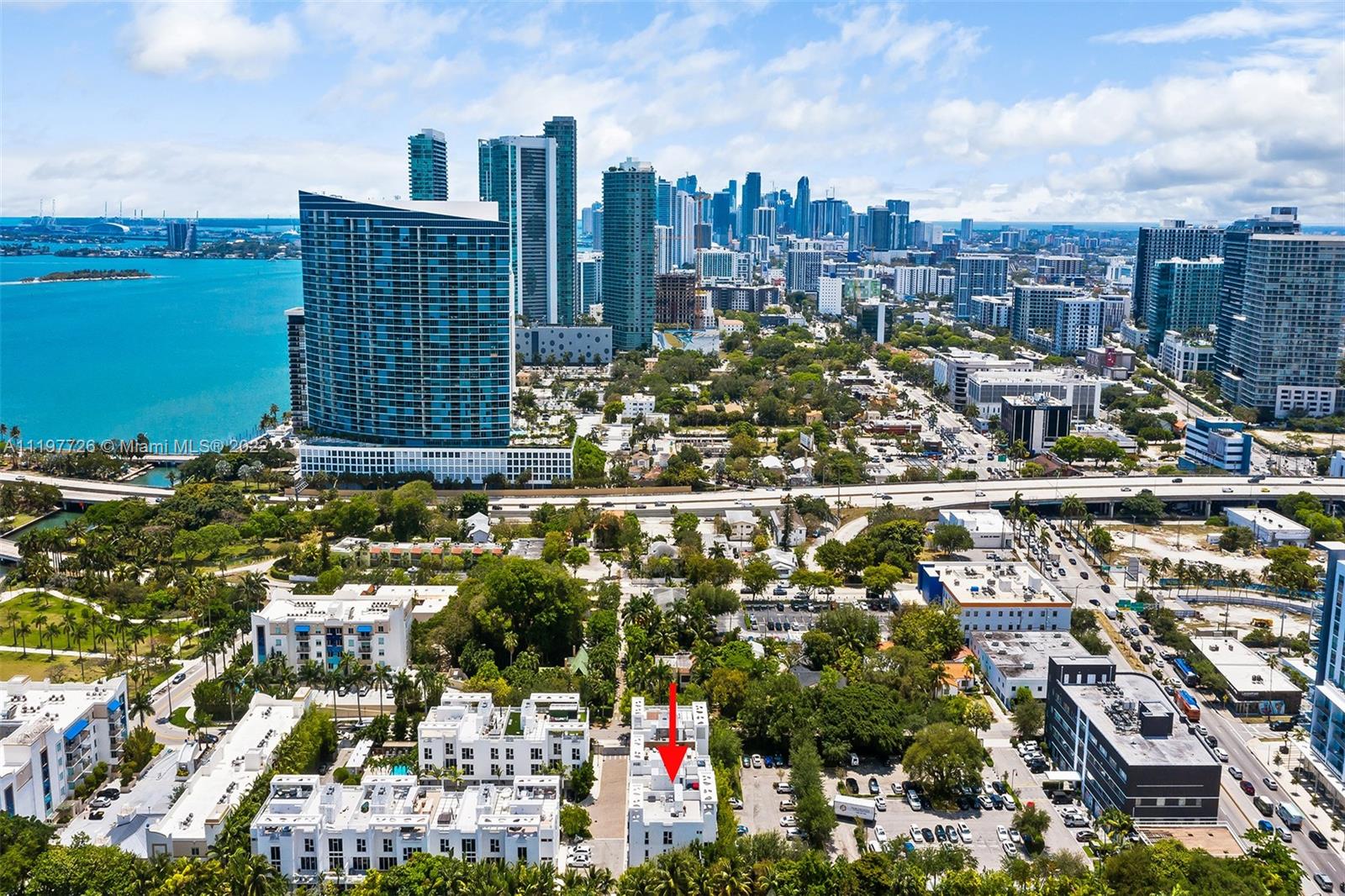455 Northeast 39th Street, Unit 112 Miami, FL 33137 - Photo 31 of 40 a view of a city with tall buildings
